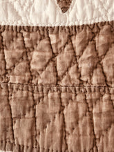 Load image into Gallery viewer, Wear on the solid brown.  Still intact but with batting showing through in places.