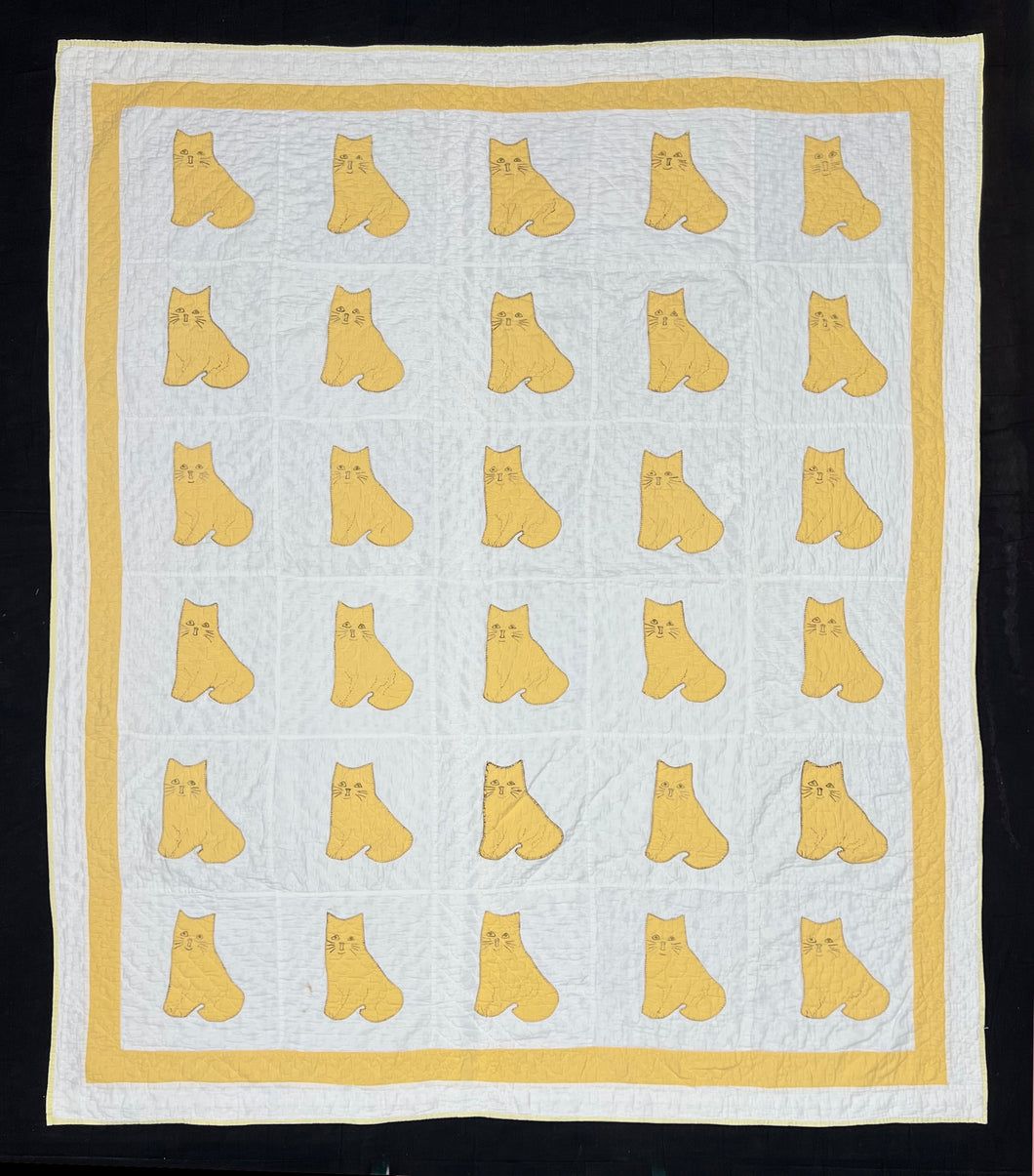 Cats on a Quilt